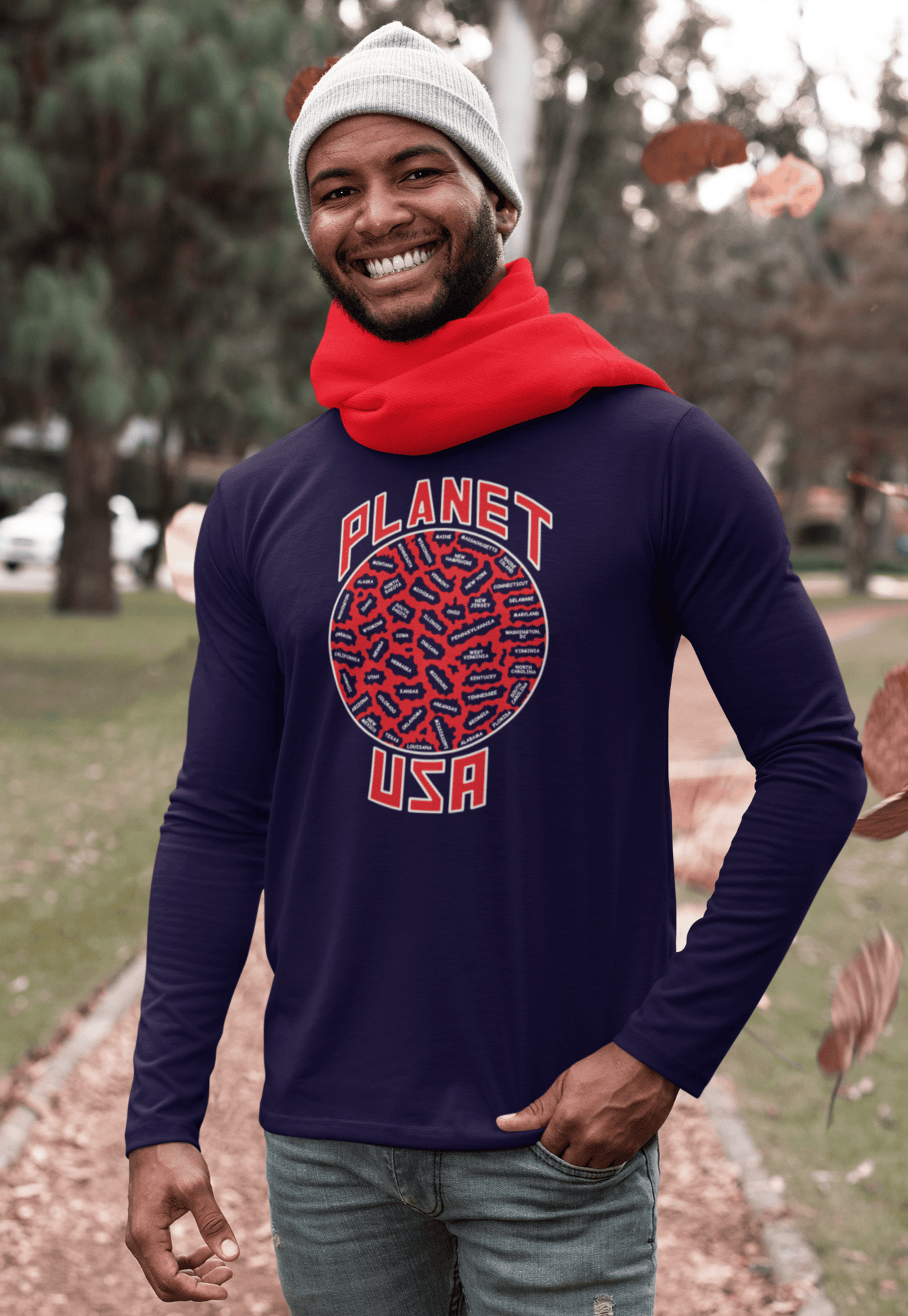 Navy-blue-shirt-Red-white-print-man-standing-with-red-scarf.png Planet USA Long Sleeve - Image 1