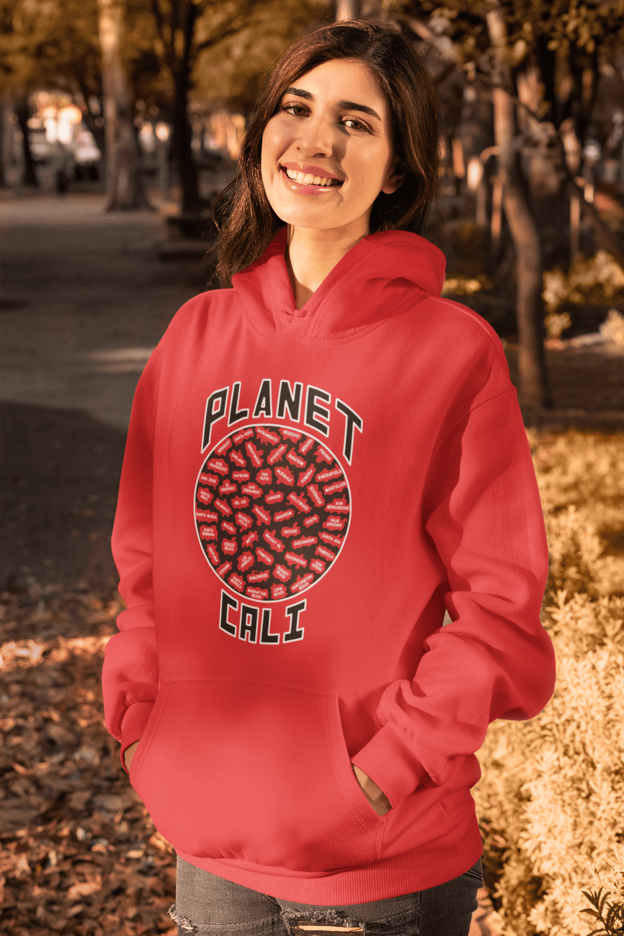 Planet-Cali-Red-hoodie-woman-in-the-fall.png Planet Cali Hoodie - Image 1