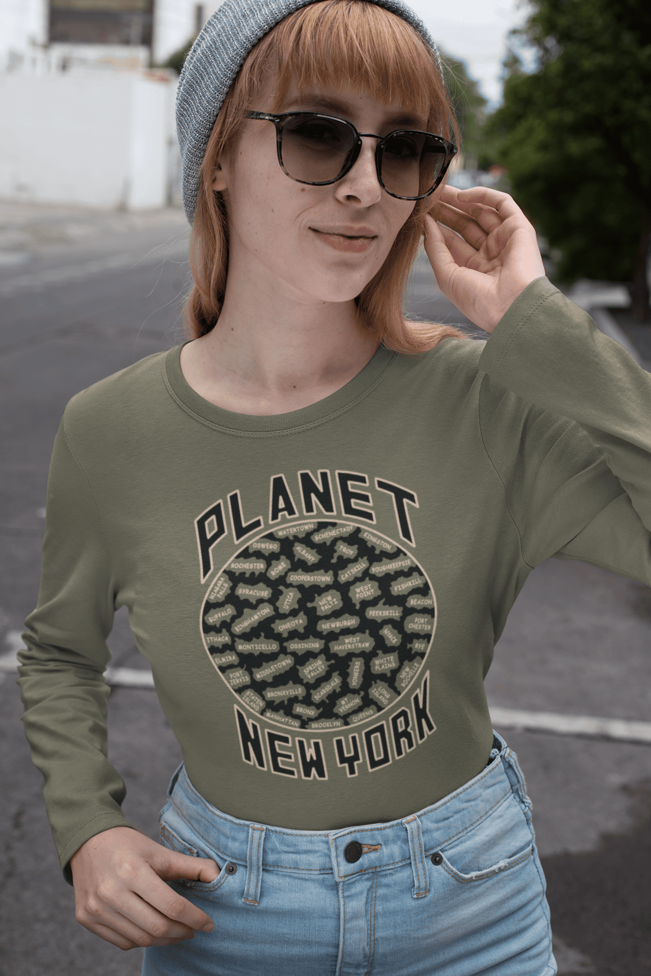 Planet-NY-MG-woman-wearing-a-beanie-and-glasses.png Planet New York Long Sleeve - Image 1