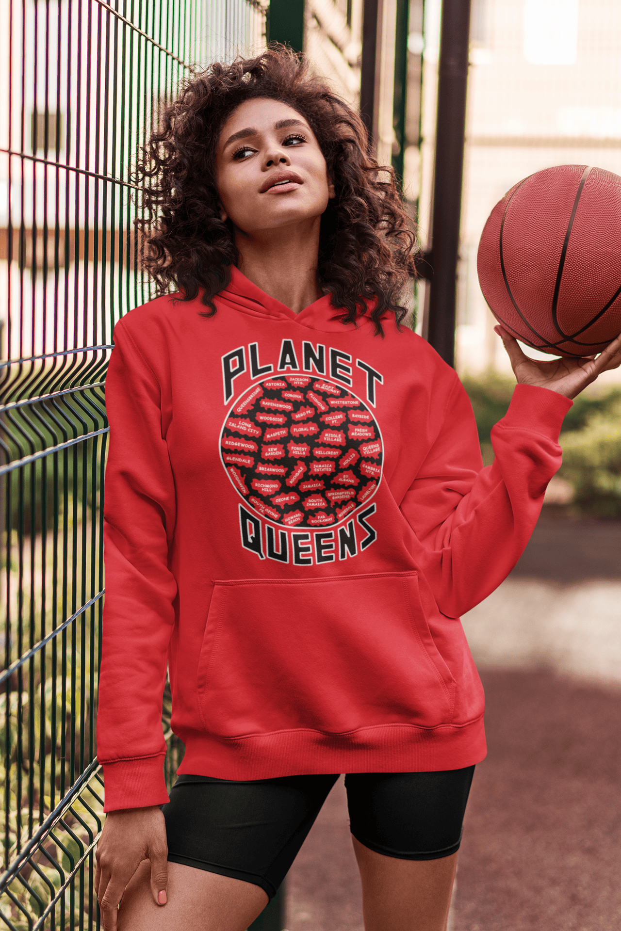 Planet-Queens-Red-hoodie-woman-with-a-basketball.png Planet Queens Hoodie - Image 1