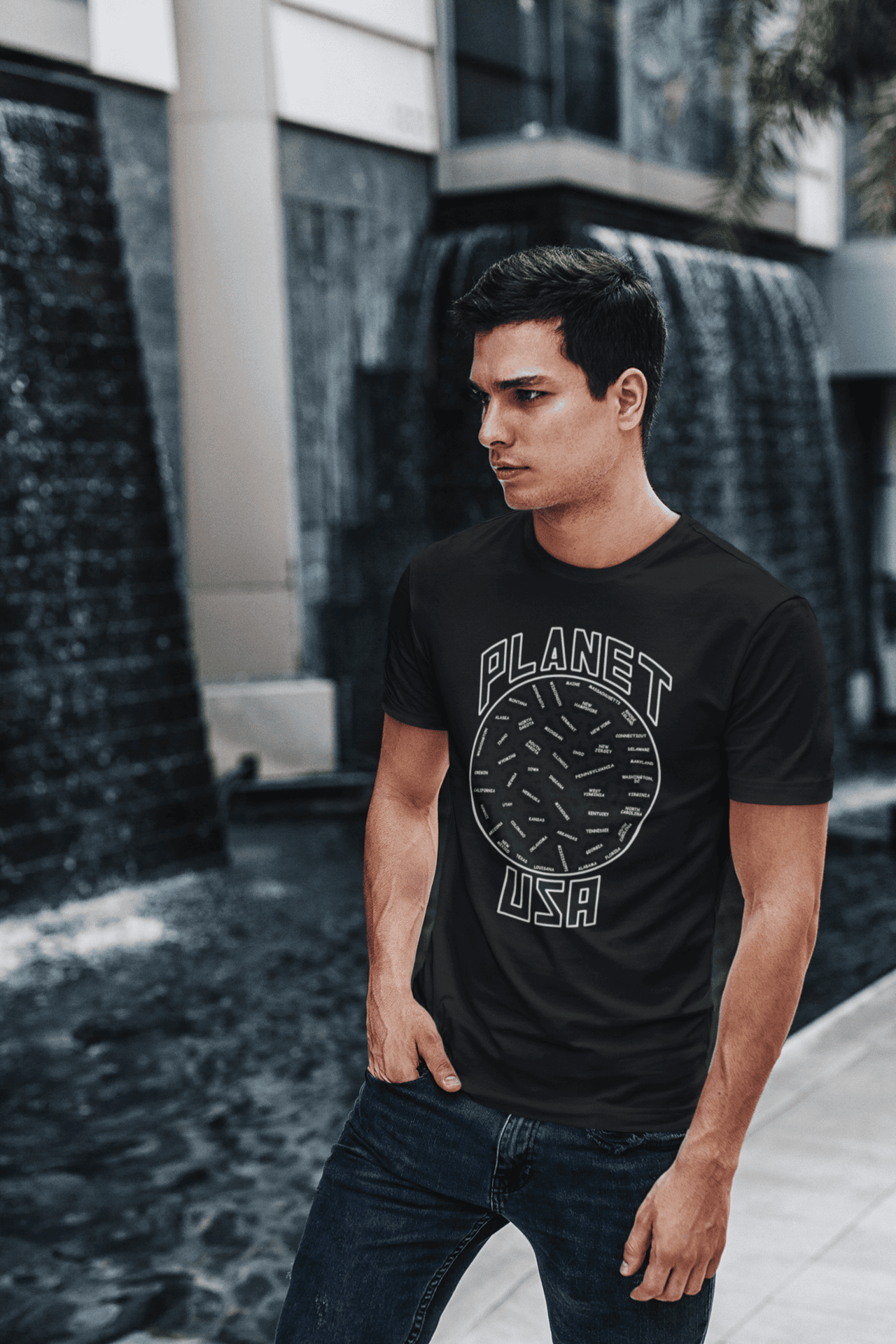 Planet-USA-Black-SS-shirt-man-walking-on-a-street.png Planet USA Short Sleeve - Image 1